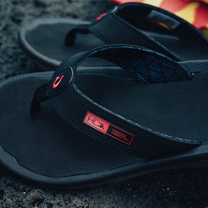 Black thong sandals with red HLA branding and logos on the straps.