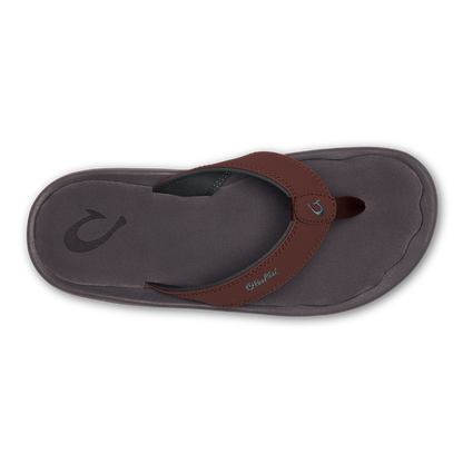 Gray flip-flop sandal with brown leather toe strap and embossed wave logo on footbed.