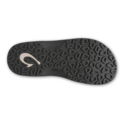 Black flip-flop sole with geometric tread pattern and white curved logo detail.