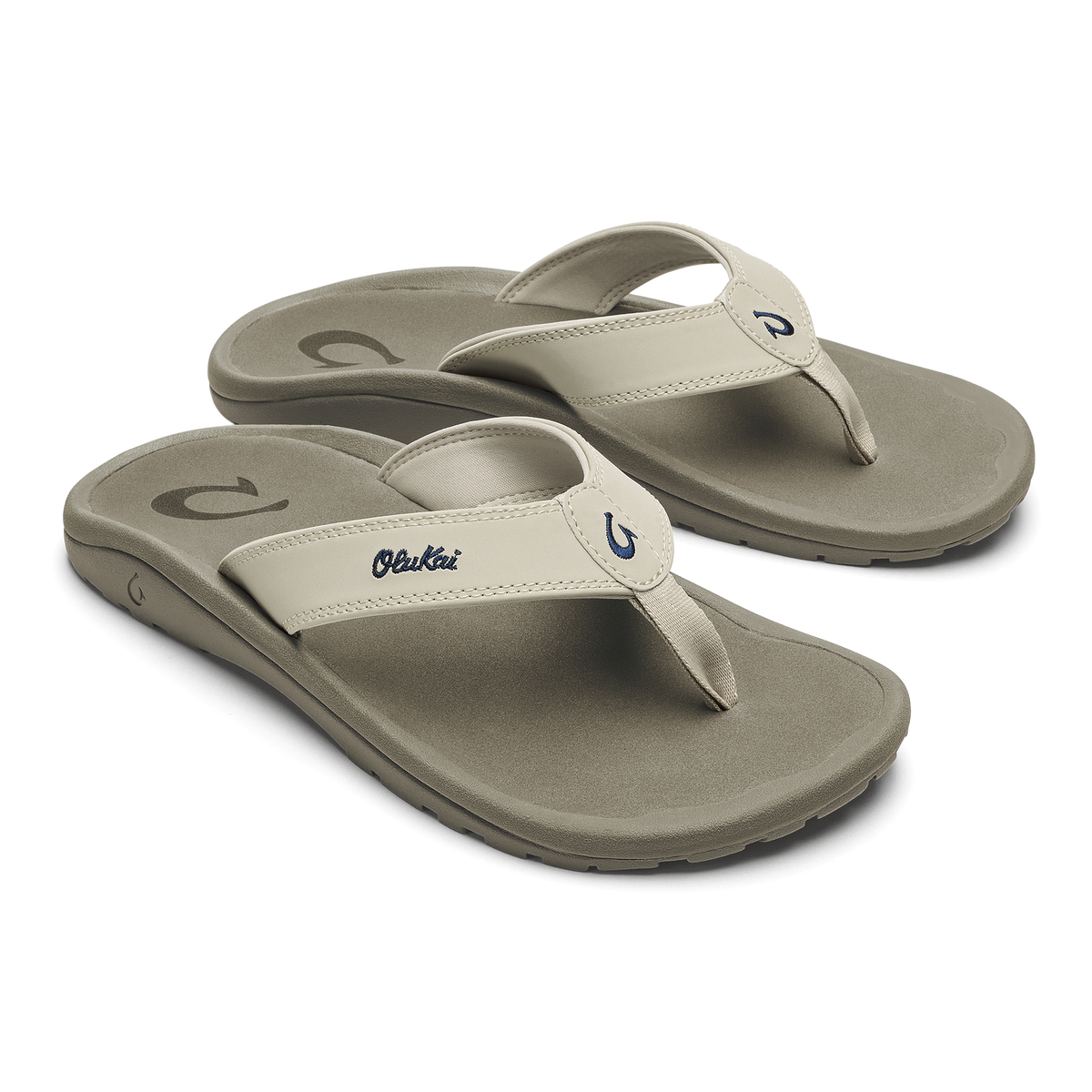 Pair of beige and gray thong sandals with cushioned soles and branded toe straps.