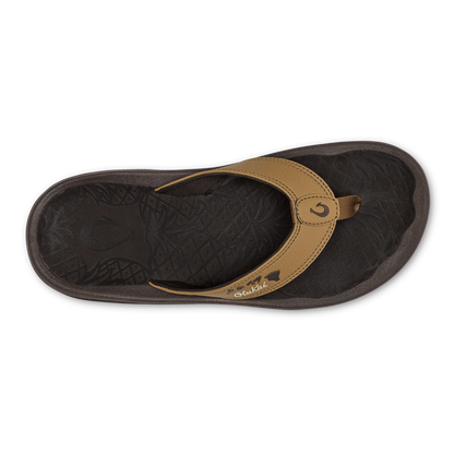 Tan and dark brown flip-flop with thong strap and textured sole, viewed from above.