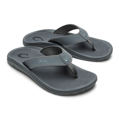 Pair of gray thong sandals with cushioned footbeds and textured straps featuring contrast stitching.