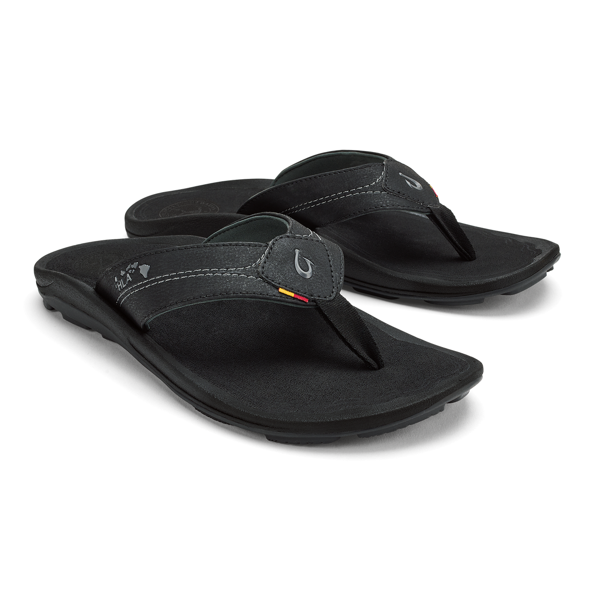 Black flip-flops with contoured footbeds and thong straps featuring contrast stitching and logo detail.