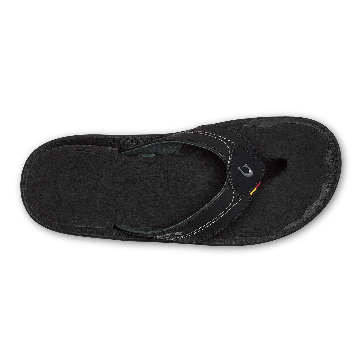 Black thong sandal with textured sole and contrast stitching detail, shown from above.