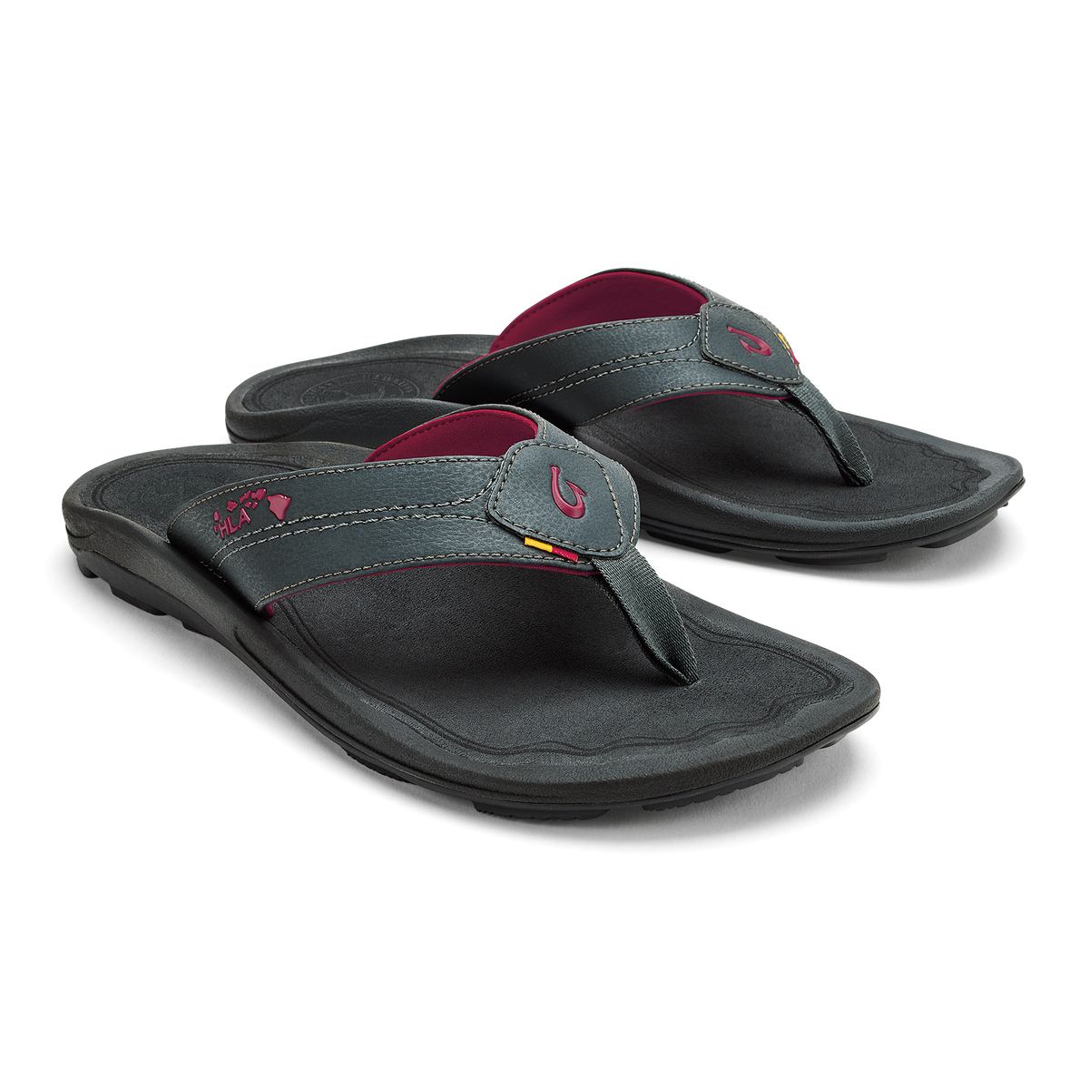Pair of dark gray thong sandals with burgundy accents and curved footbeds, shown from a three-quarter angle.