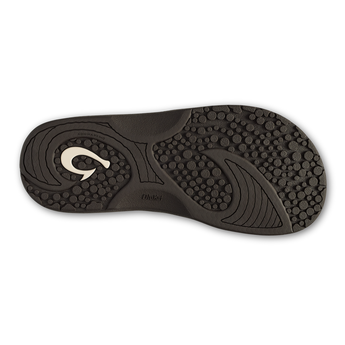 Dark Java sole of Nalu Slide sandal with textured grip pattern and curved design elements.