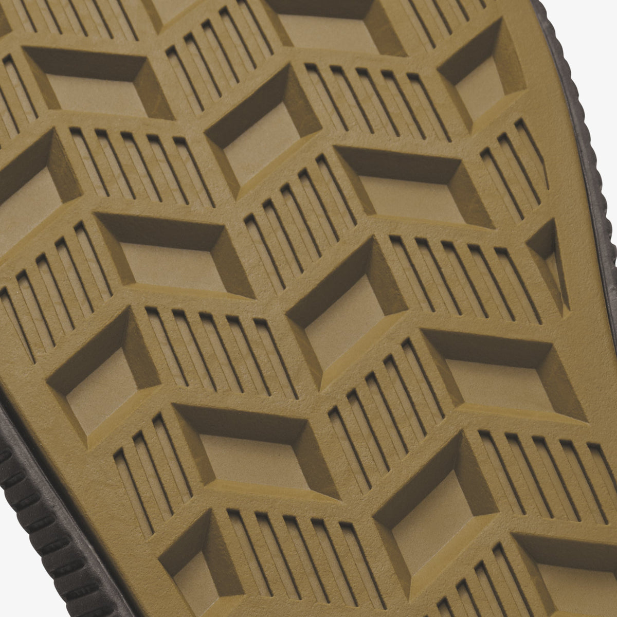 Tan and gray sole with geometric tread pattern featuring diamond shapes and parallel lines.