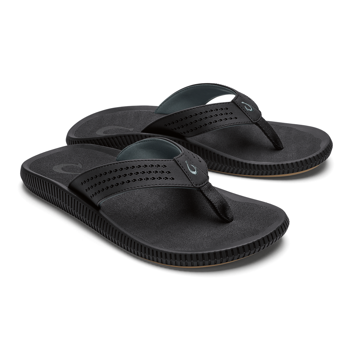 Pair of black thong flip-flops with textured straps and ridged soles.