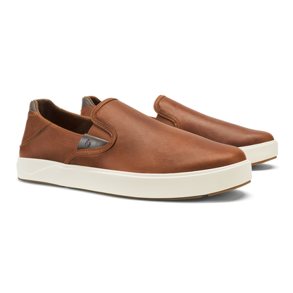 Tan leather slip-on sneaker with cream-colored rubber sole and dark heel tab.