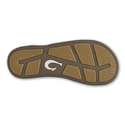 Tan and brown rubber sole with textured tread pattern and white curved logo detail.