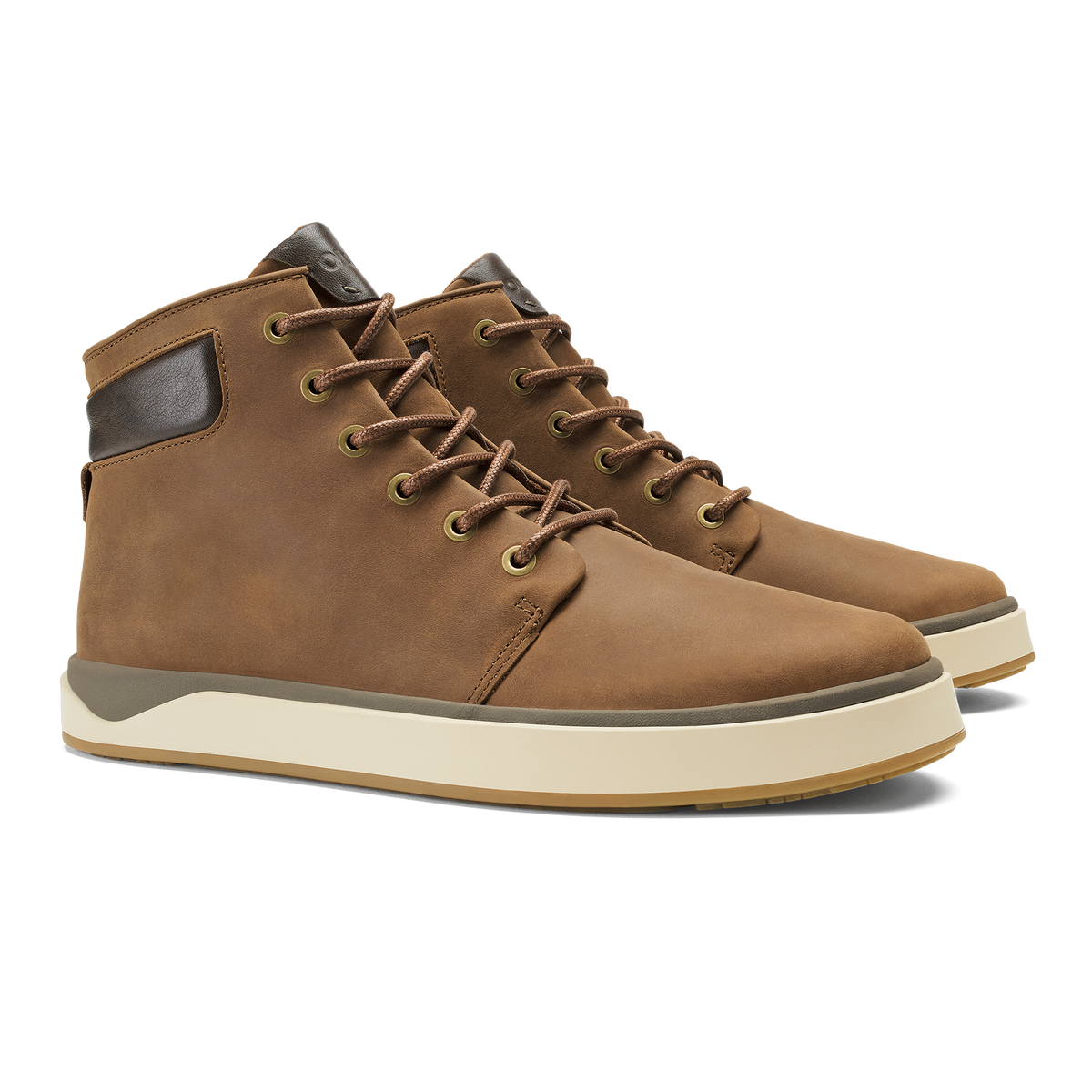 Pair of toffee-colored lace-up boots with dark brown collar trim and cream platform sole.