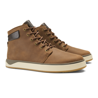 Pair of toffee-colored lace-up boots with dark brown collar trim and cream platform sole.