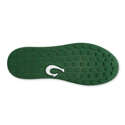 Green sole with arrow-pattern tread and white logo cutout, viewed from bottom.