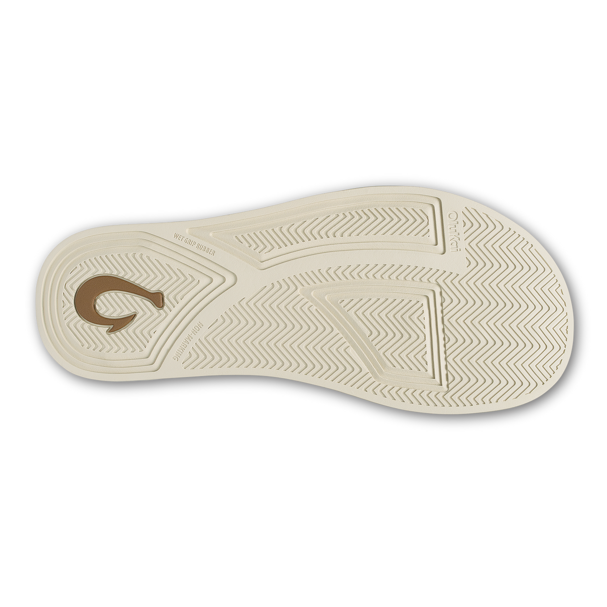 Cream-colored shoe sole with geometric tread pattern and toffee-brown circular logo in center.