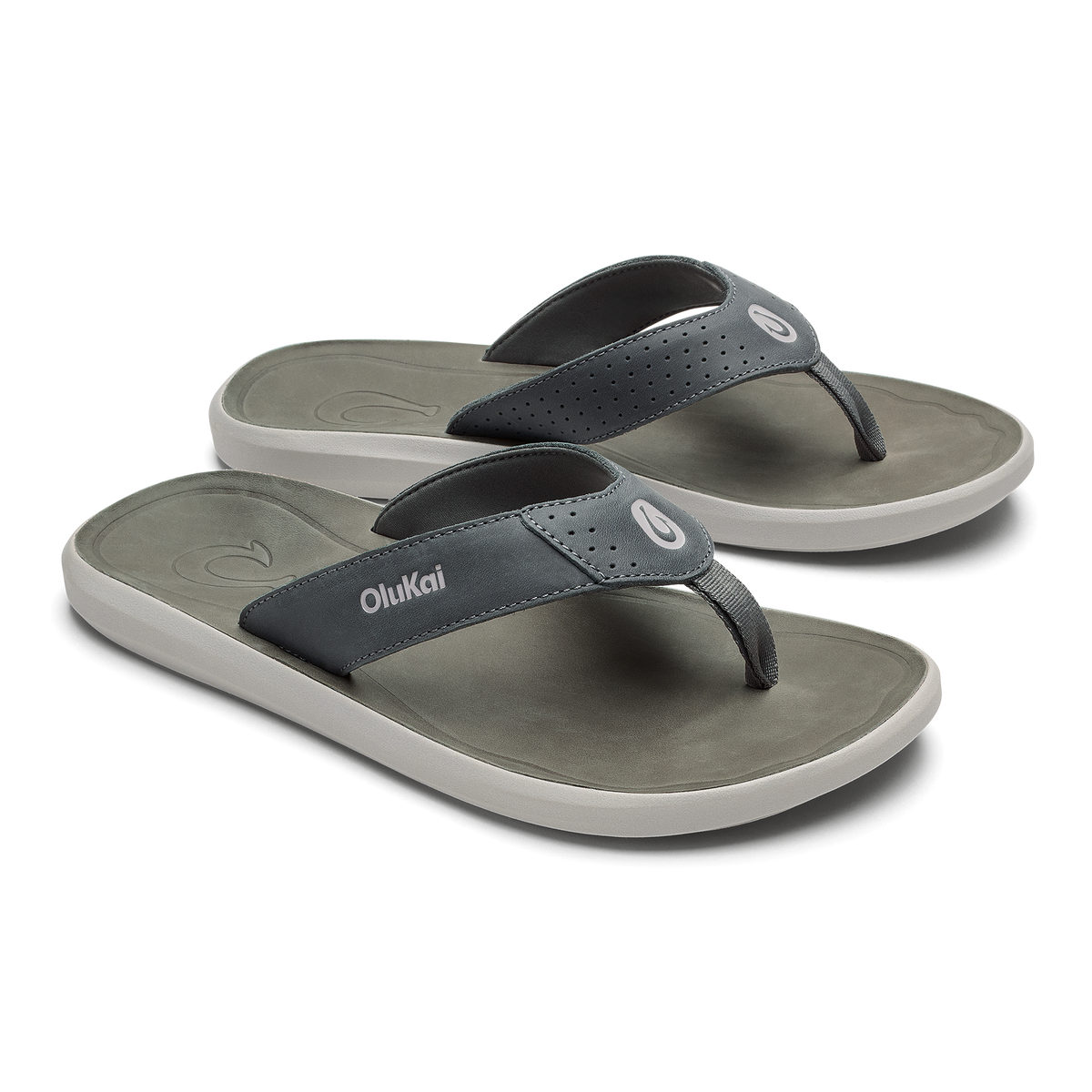 Pair of thong sandals with dark charcoal straps and ash gray footbeds with white soles.