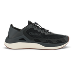 Black Olukai ʻAhi athletic shoe with cream midsole and textured upper, shown in profile view.