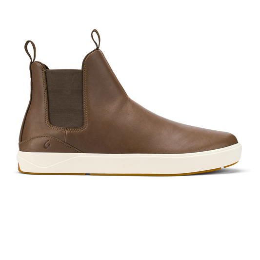 Brown leather Chelsea-style mid boot with cream and tan rubber sole and pull loops on heel.