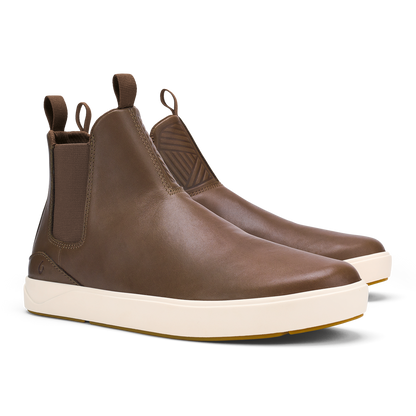 Brown leather Chelsea boot with cream-colored platform sole and elastic side panel.