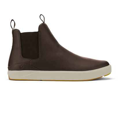Dark brown leather Chelsea boot with cream and tan sole, elastic side panels, and pull tab.