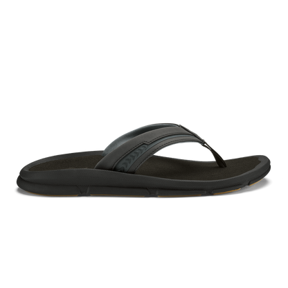 Black flip-flop sandal with textured footbed and padded toe strap.