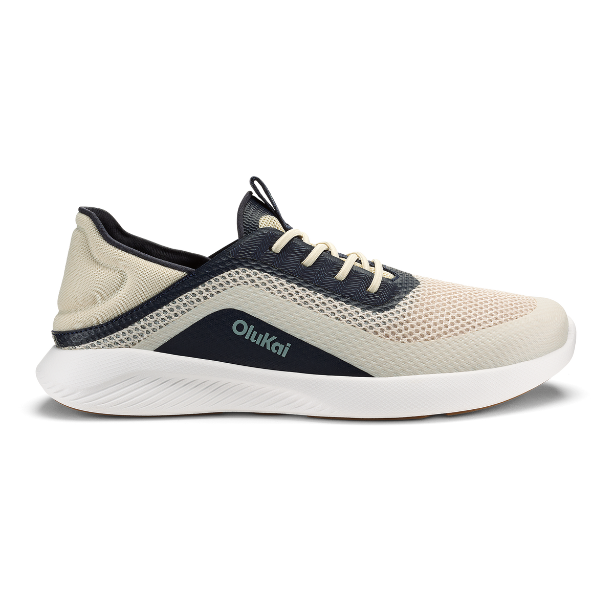 Kialoa sneaker in cream and navy with mesh upper, white sole, and navy heel panel.