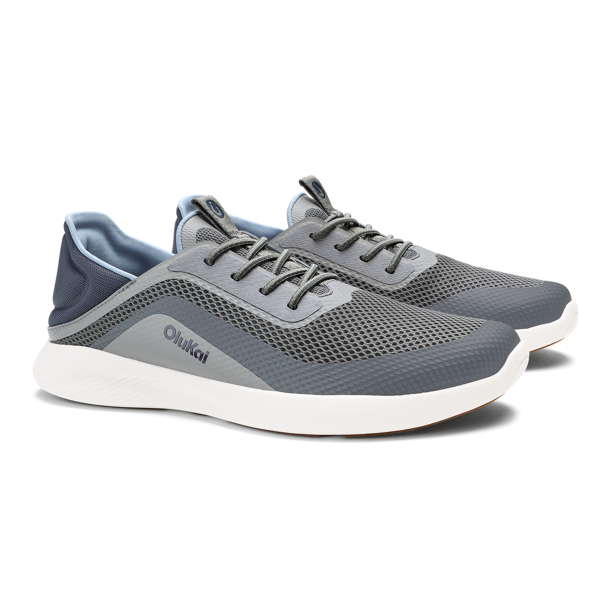 Charcoal and gray mesh athletic shoe with white sole and dark laces.