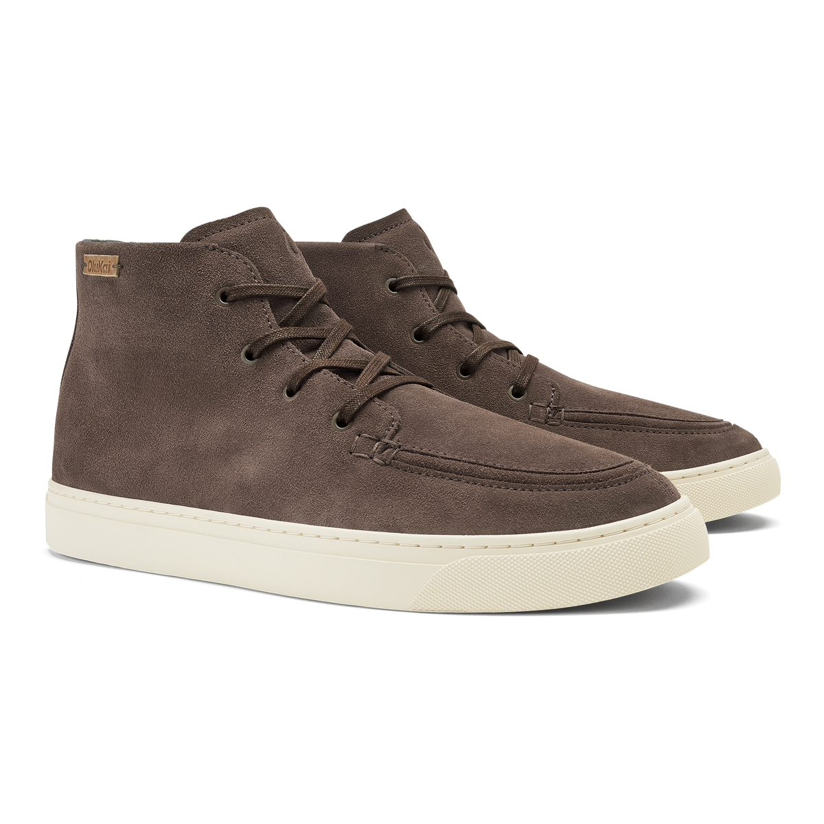 Dark brown suede chukka boots with cream rubber sole and lace-up closure.