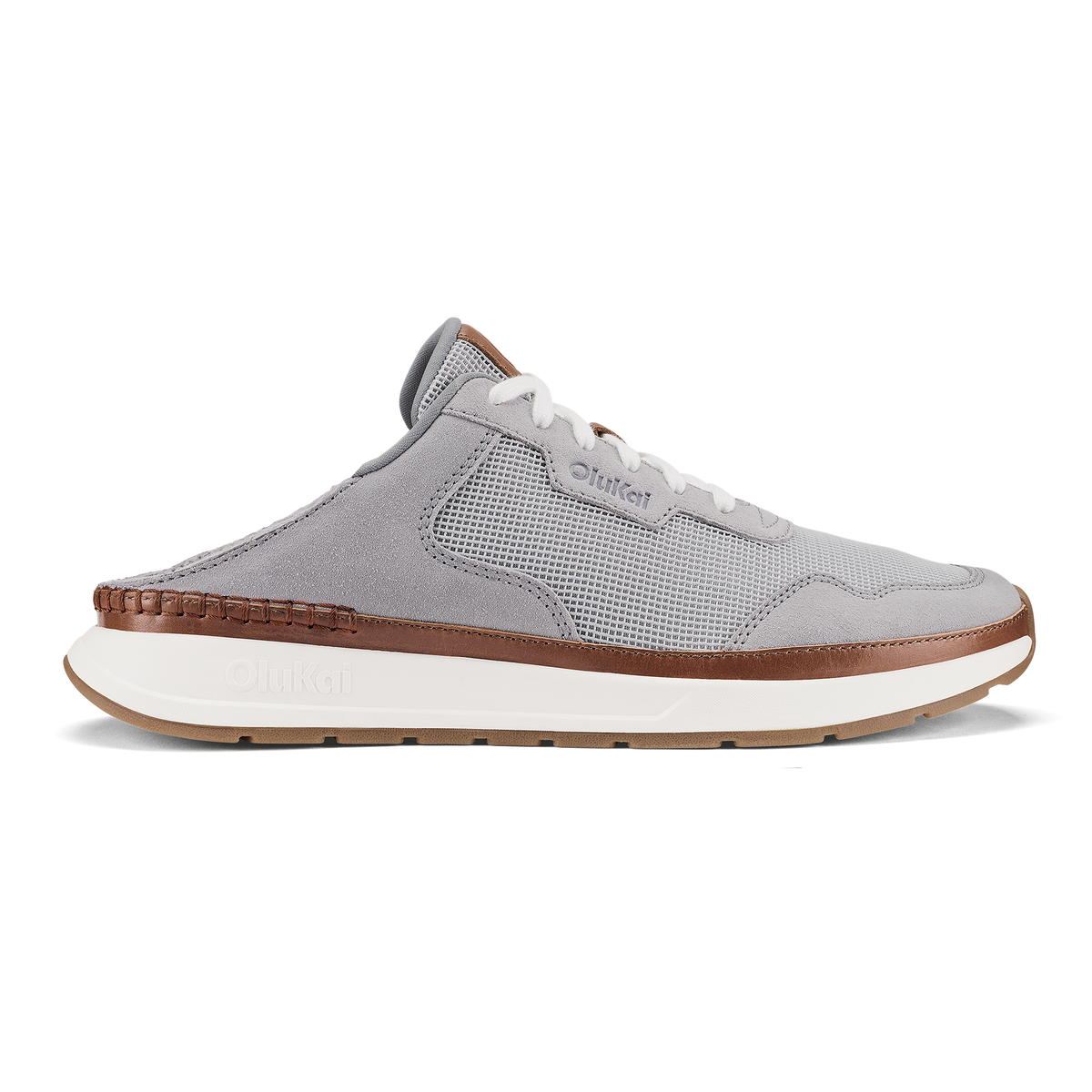 Light grey mule sneaker with brown leather trim, mesh upper, and white cushioned sole.