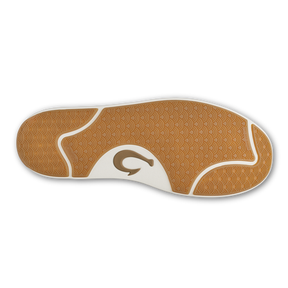 Tan and white shoe sole with geometric wave pattern and curved wave logo in center.