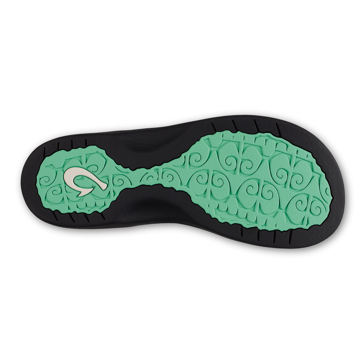 Shoe sole with black rubber outer edge and mint green textured center featuring ornamental scroll pattern and logo.