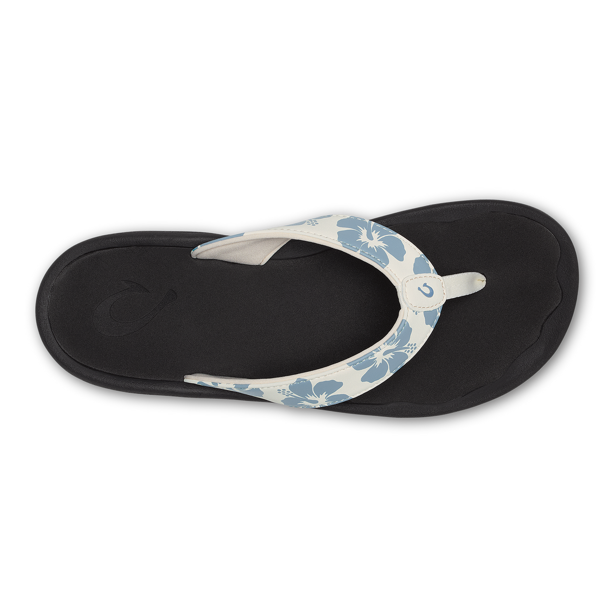 White and blue floral flip-flop with black sole, viewed from above.