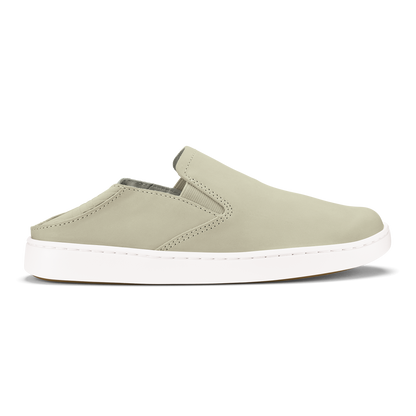 Ecru leather slip-on mule with white sole and decorative stitching detail.