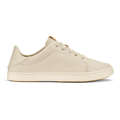 Cream-colored leather lace-up sneaker with tan heel accent and stitched details, shown in profile view.