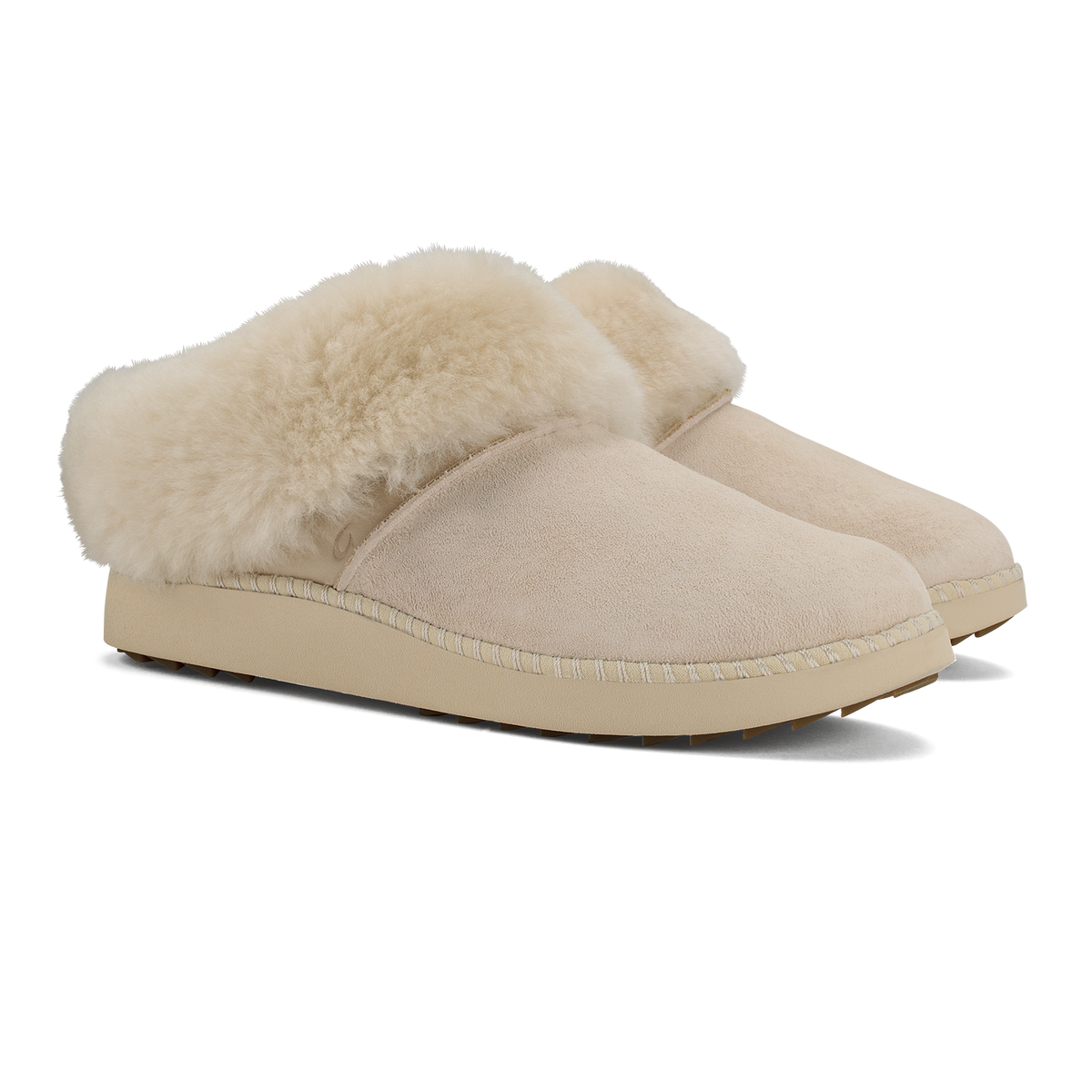 Cream-colored slipper with fuzzy sheepskin collar and cushioned sole.