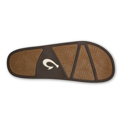 Tan and dark brown shoe sole with leaf-pattern panels and white logo.