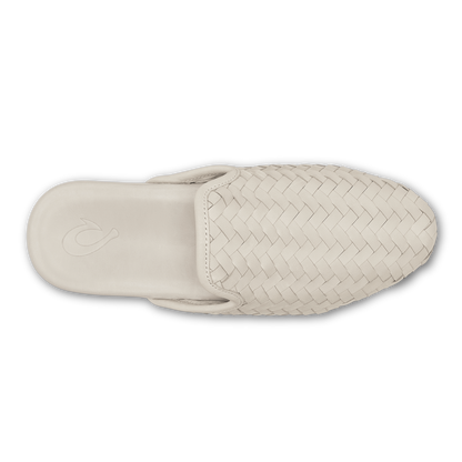 Cream-colored woven slip-on slipper with textured basketweave upper and smooth sole, shown from above.