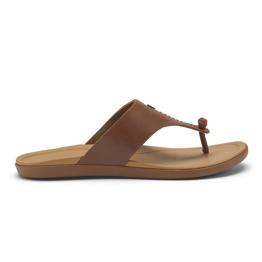 Brown and tan thong sandal with cushioned footbed and knot detail at toe.