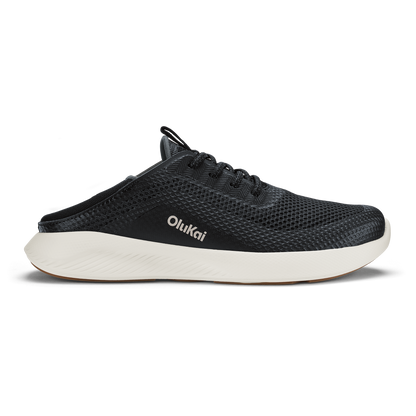 Black mesh slip-on shoe with white midsole sole and OluKai branding on the side.