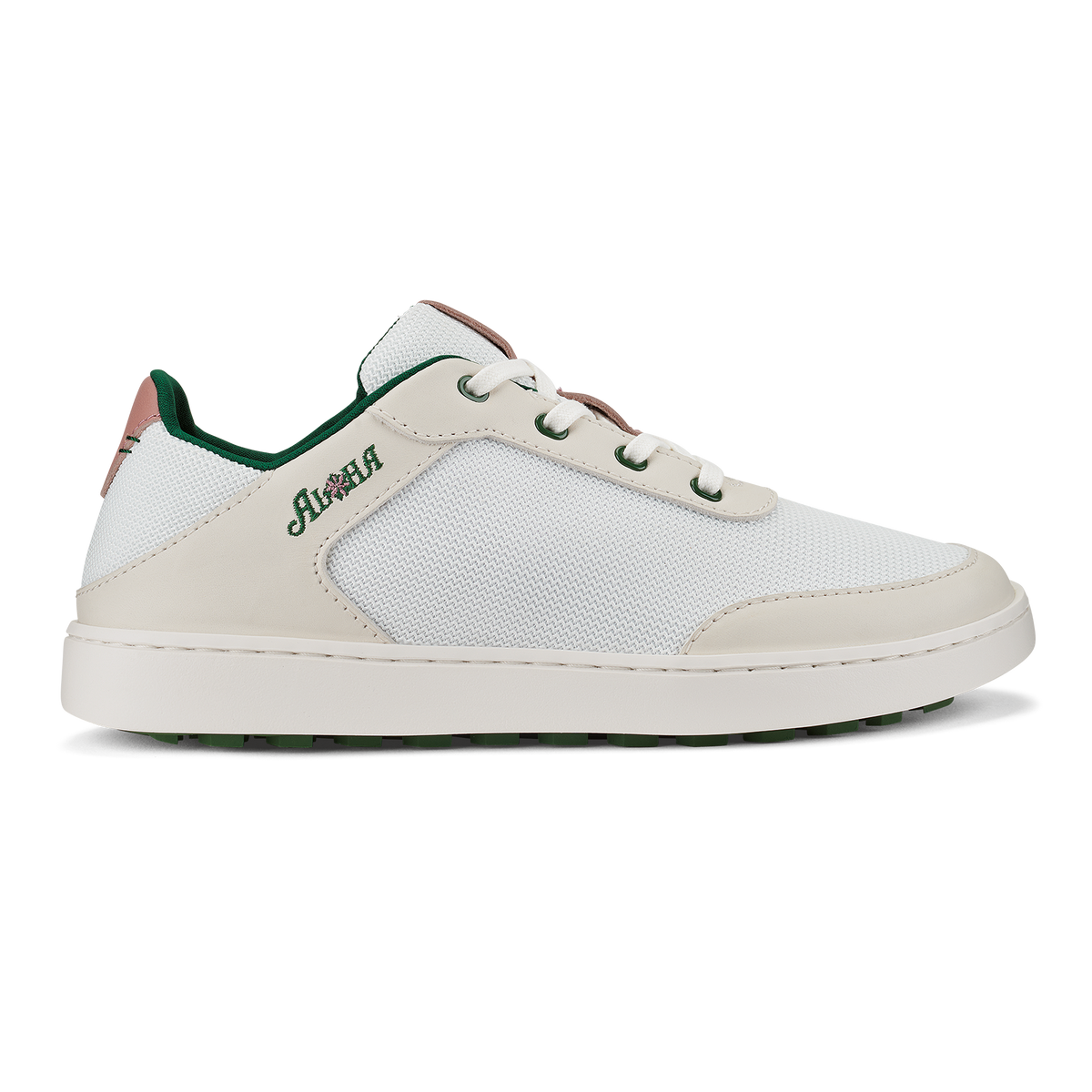 White lace-up sneaker with mesh and leather paneling, green and brown heel accents, and white sole.