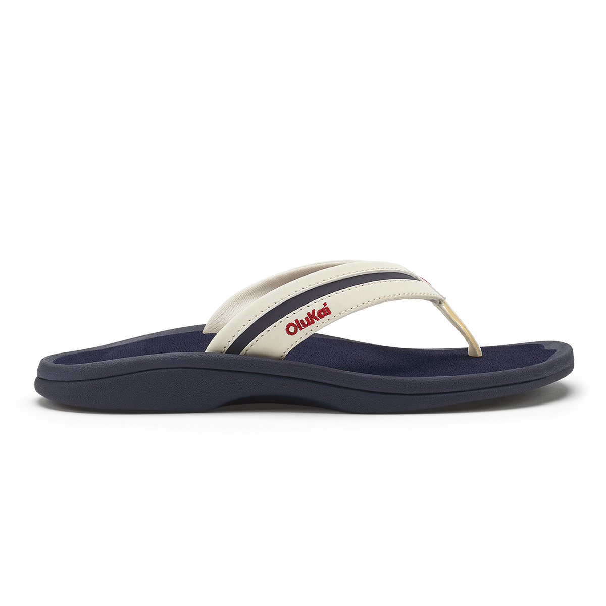White and navy thong sandal with padded footbed and red text on the strap.