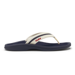 White and navy thong sandal with padded footbed and red text on the strap.