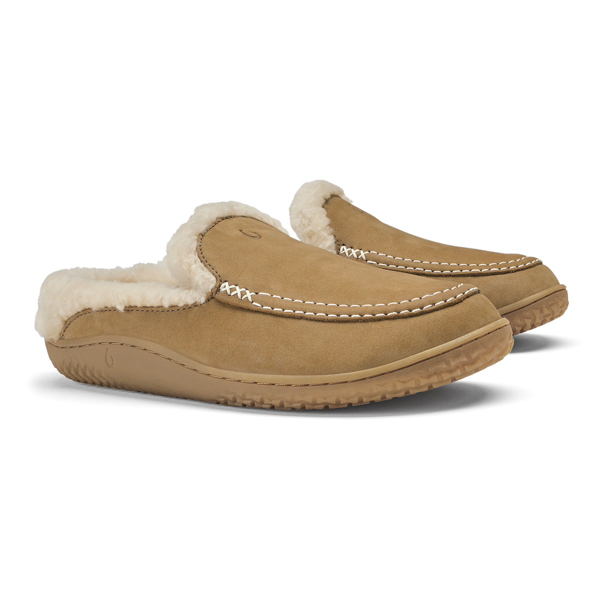 Tan suede loafer slippers with cream fleece lining and white stitching detail.